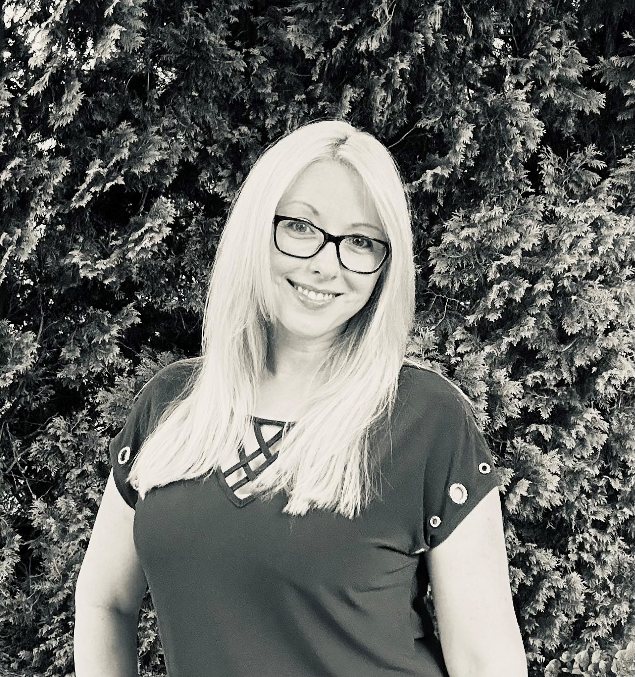 Professional headshot of Kaitlin Kiely, Ironistic team member