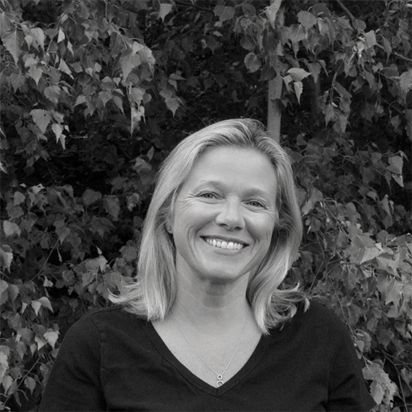 Professional headshot of Deanna Kennedy, Ironistic team member