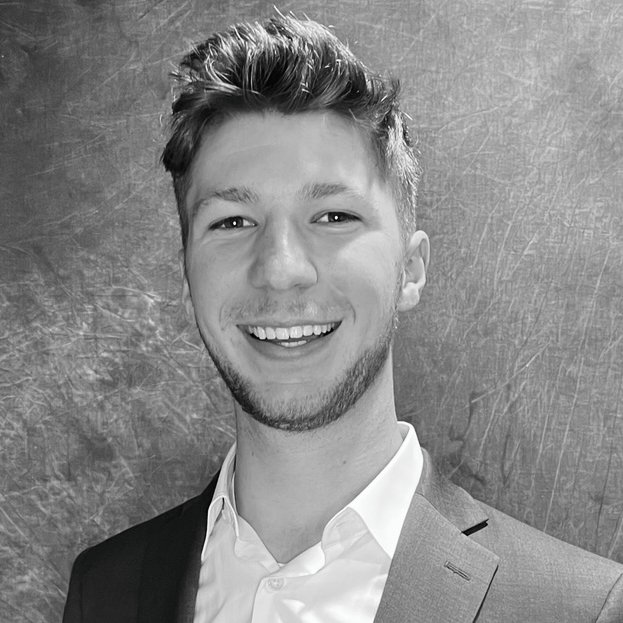 Professional black-and-white headshot of Max Hanson, Ironistic team member
