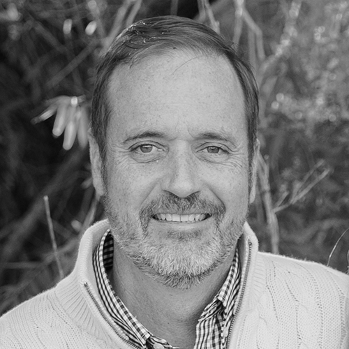 Professional black-and-white headshot of Kevin Corbett, Director of Marketing at Ironistic