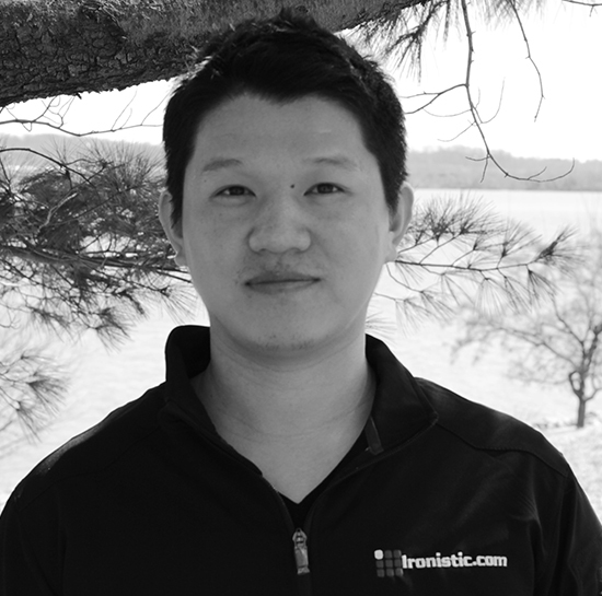 Professional black-and-white headshot of Vee Lee, Ironistic team member