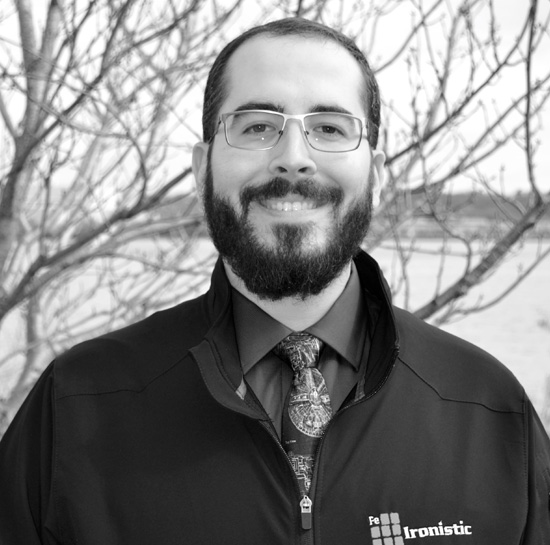 Professional black-and-white headshot of Josh Hall, Ironistic team member