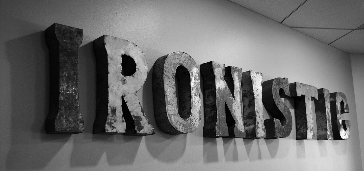 Ironistic office sign masthead